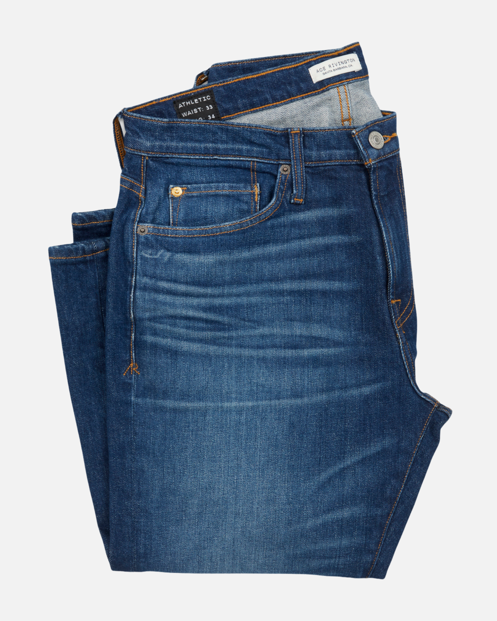front of folded dark blue men's athletic taper vintage jeans with slight wear