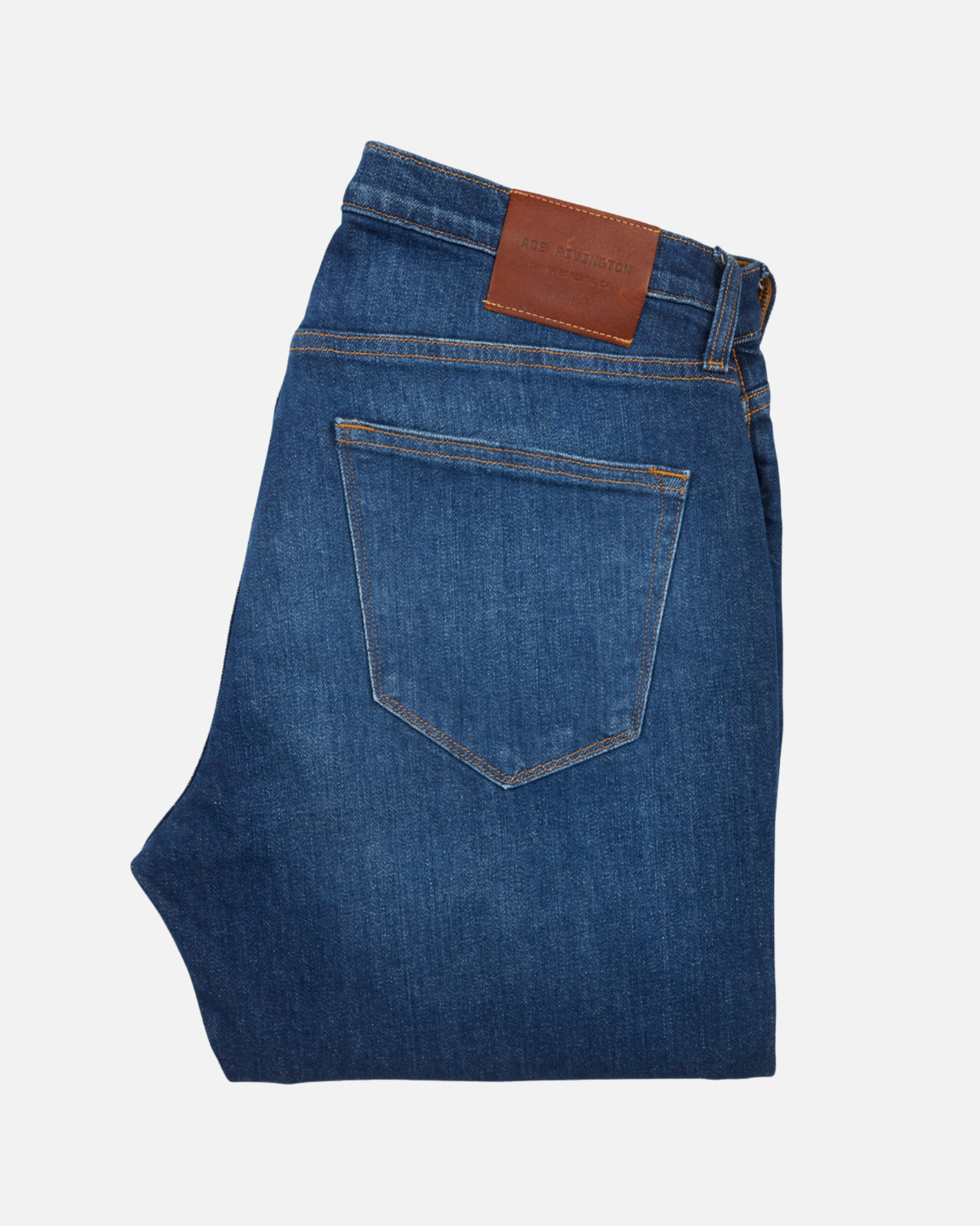 back of folded dark blue vintage athletic taper jeans
