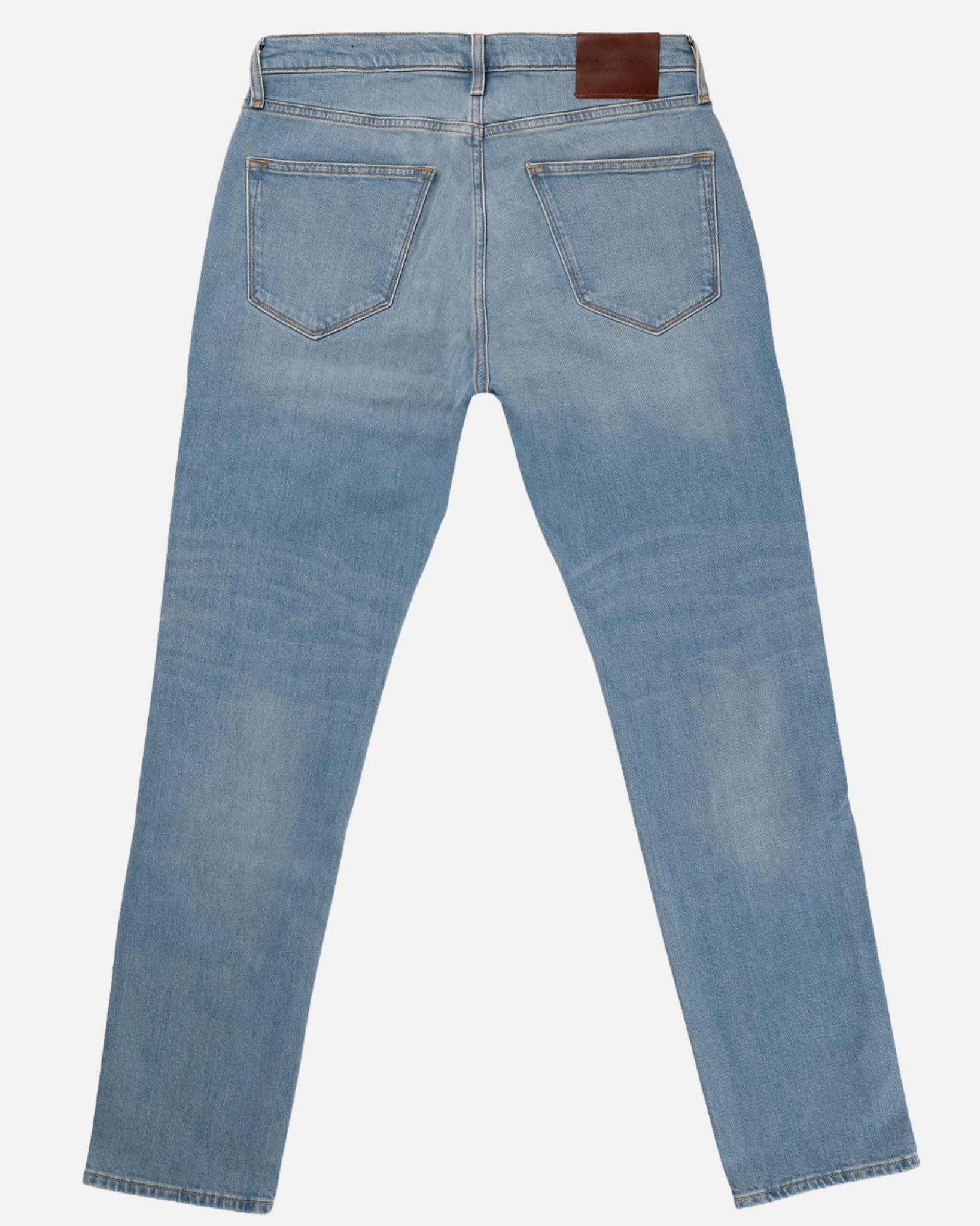 Back view of Athletic Taper Denim Jeans - Light Vintage with two back pockets and a brown leather patch on the waistband.