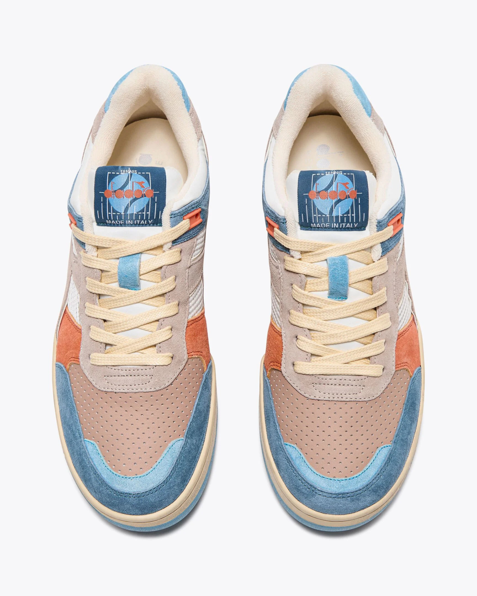 Diadora B.560 USED - Tourney Italia top-down view of both shoes highlighting symmetry, tongue branding, and lace placement.
