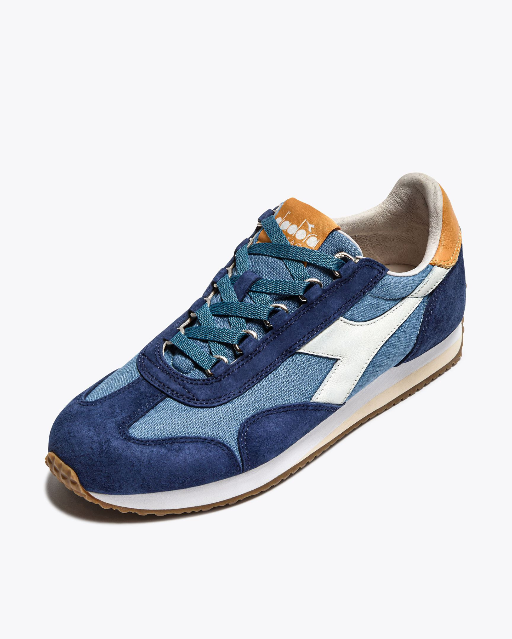 Diadora - Equipe Canvas SW EVO - Blue Coop shoe front angle view highlighting the lace structure, layered panel construction, and toe cap in contrasting blue tones.