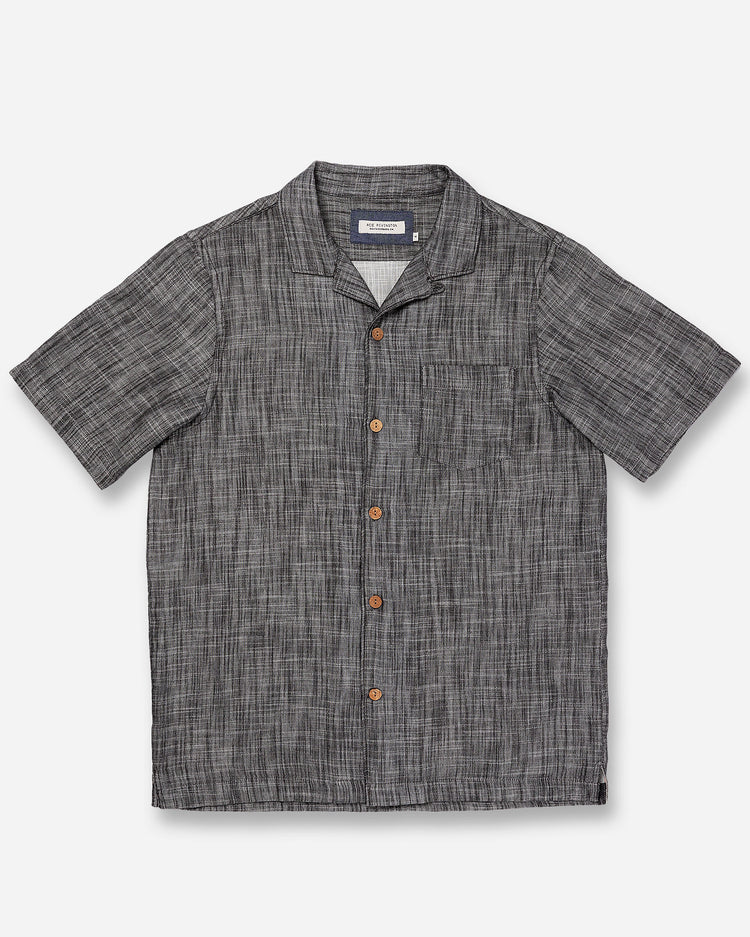Flat lay of front of Ace Rivington "Black" Double gauze soft-textured cotton fabric camp collar shirt with coconut buttons and left-breast pocket