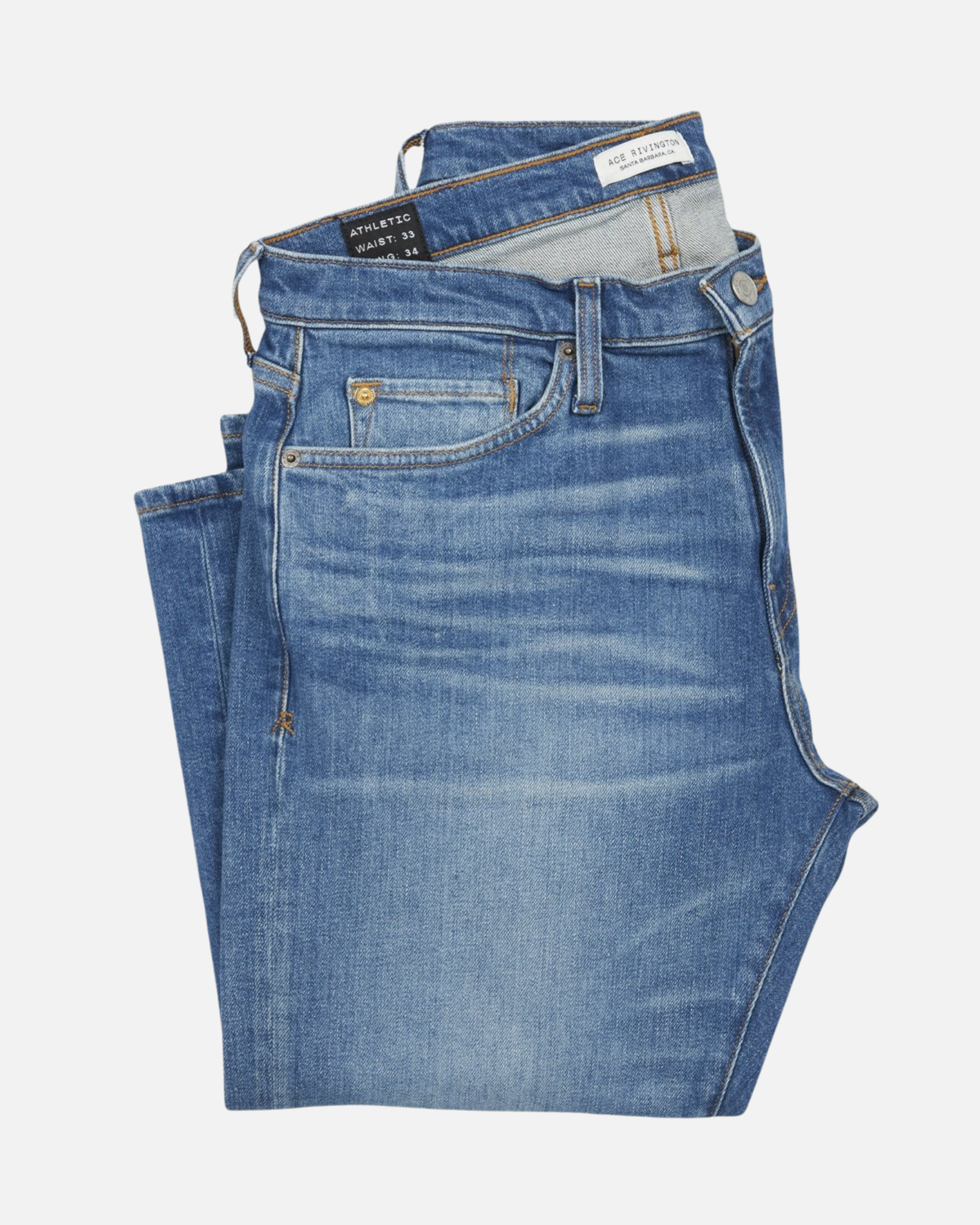 front of folded pair of high quality slim cut men's light blue jeans with slight wear