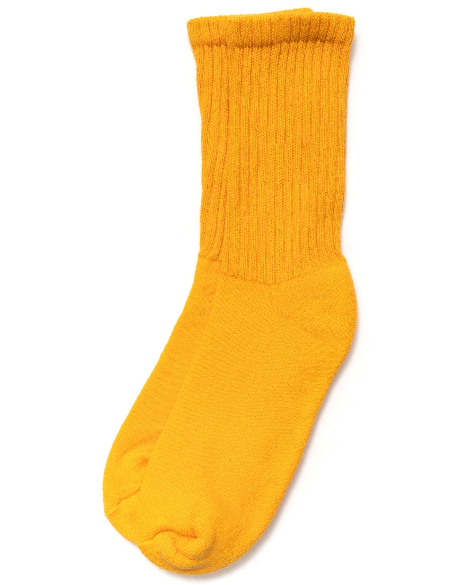 The Solids - Golden Yellow top-down view of ribbed socks with smooth cotton texture on a white background.