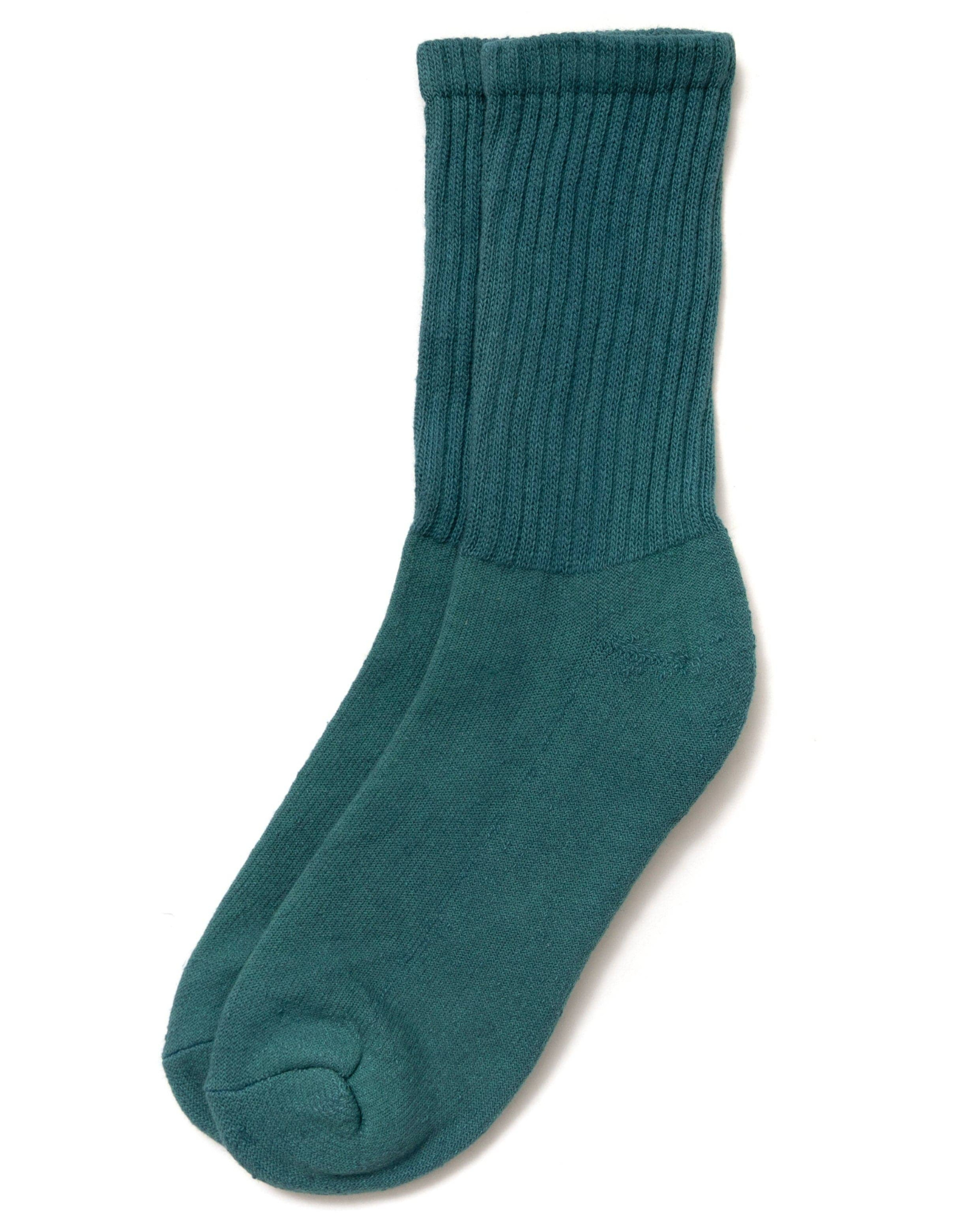 The Solids - Spruce laid flat in a top-down view with ribbed cuff and vibrant teal color on a white background.