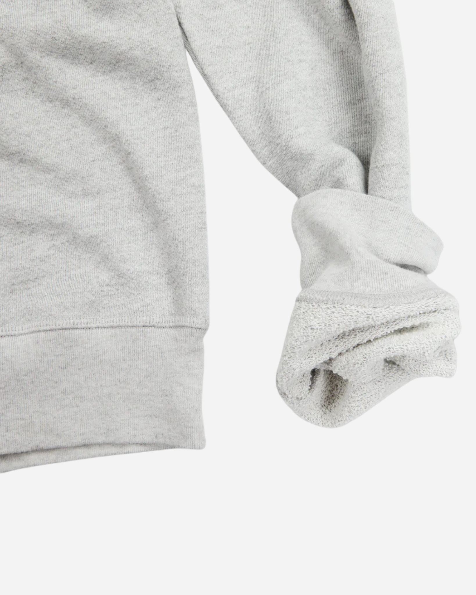 bottom right hand view of off white grey homespun french terry crew neck sweatshirt with white accent stitching with rolled up sleeve