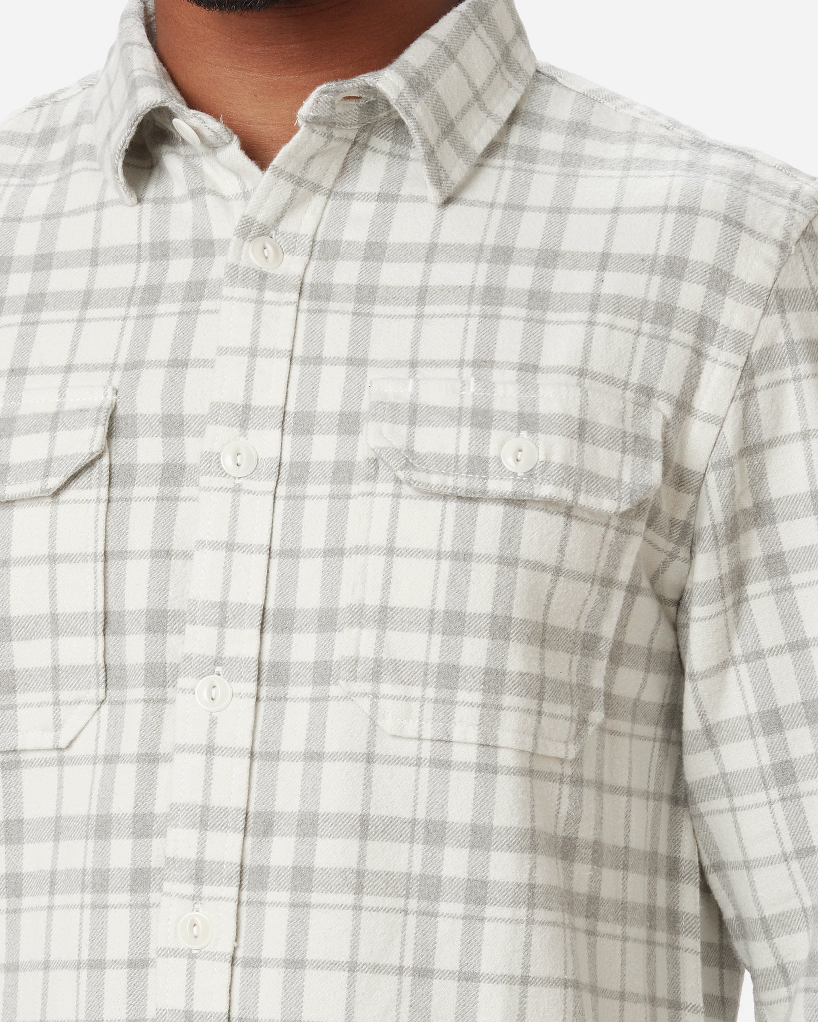 left side of collar, buttons, and neck of model wearing men's Ace Rivington off white and grey soft bushed flannel shirt