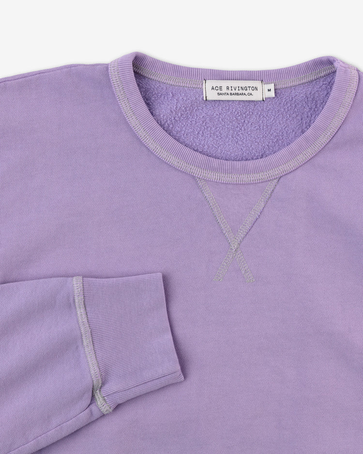 right sleeve set near collar of organic cotton sweatshirt in digital lavender