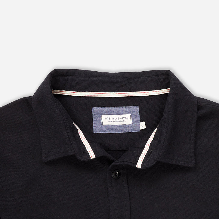 collar, tag, and white and red interior collar stitching on Ace Rivington men's black soft brushed flannel shirt 