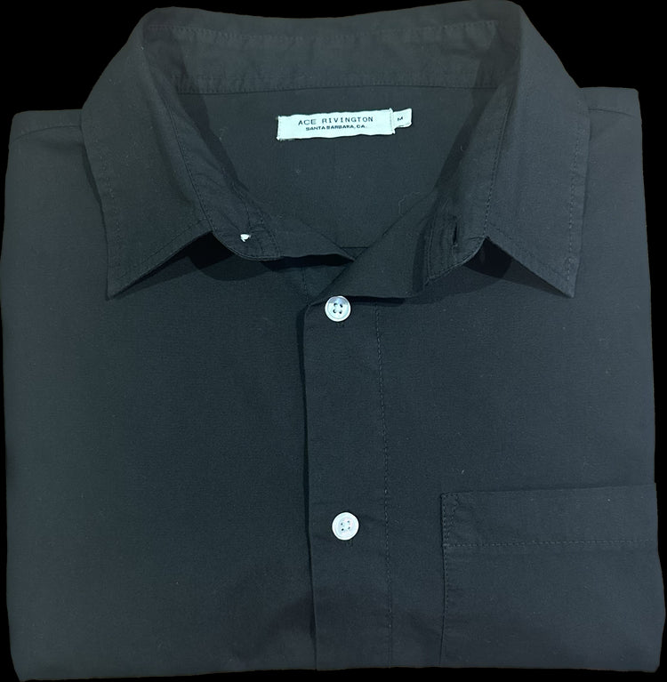 front of folded men's black long sleeve tailored poplin shirt with color matched buttons and a single pocket in standard height option