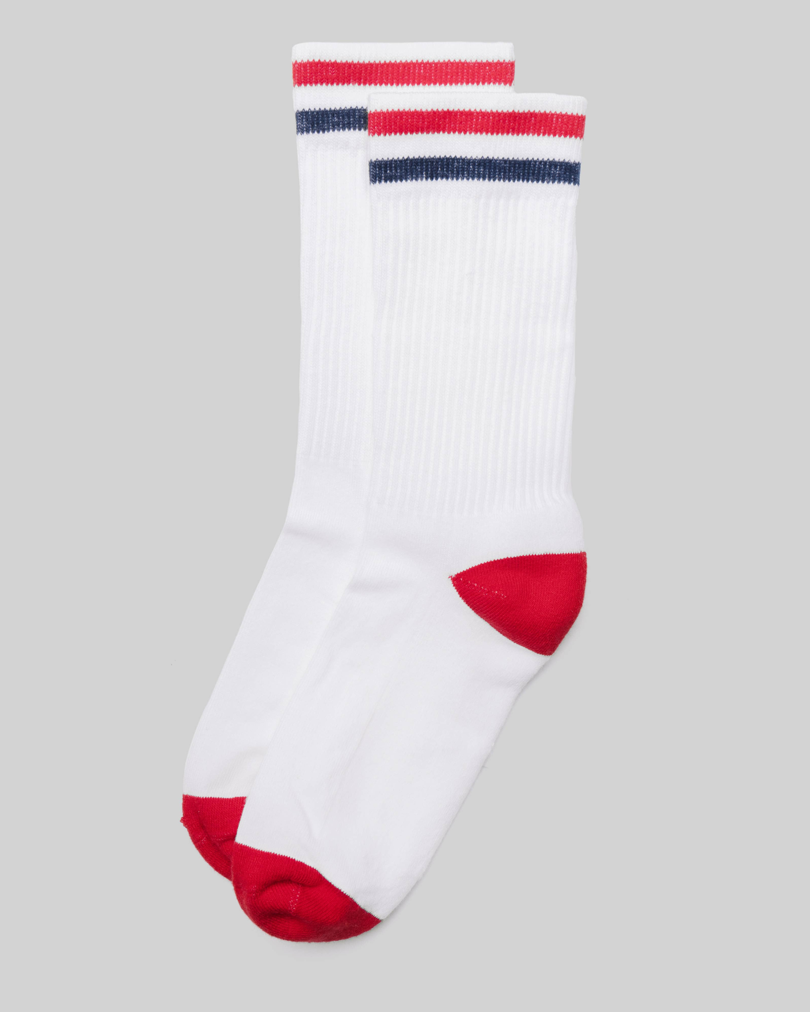 Kennedy Luxe Athletic Socks - White/Red/Navy shown laid flat in a top-down view with red and navy cuff stripes, red heel and toe on a light grey background.
