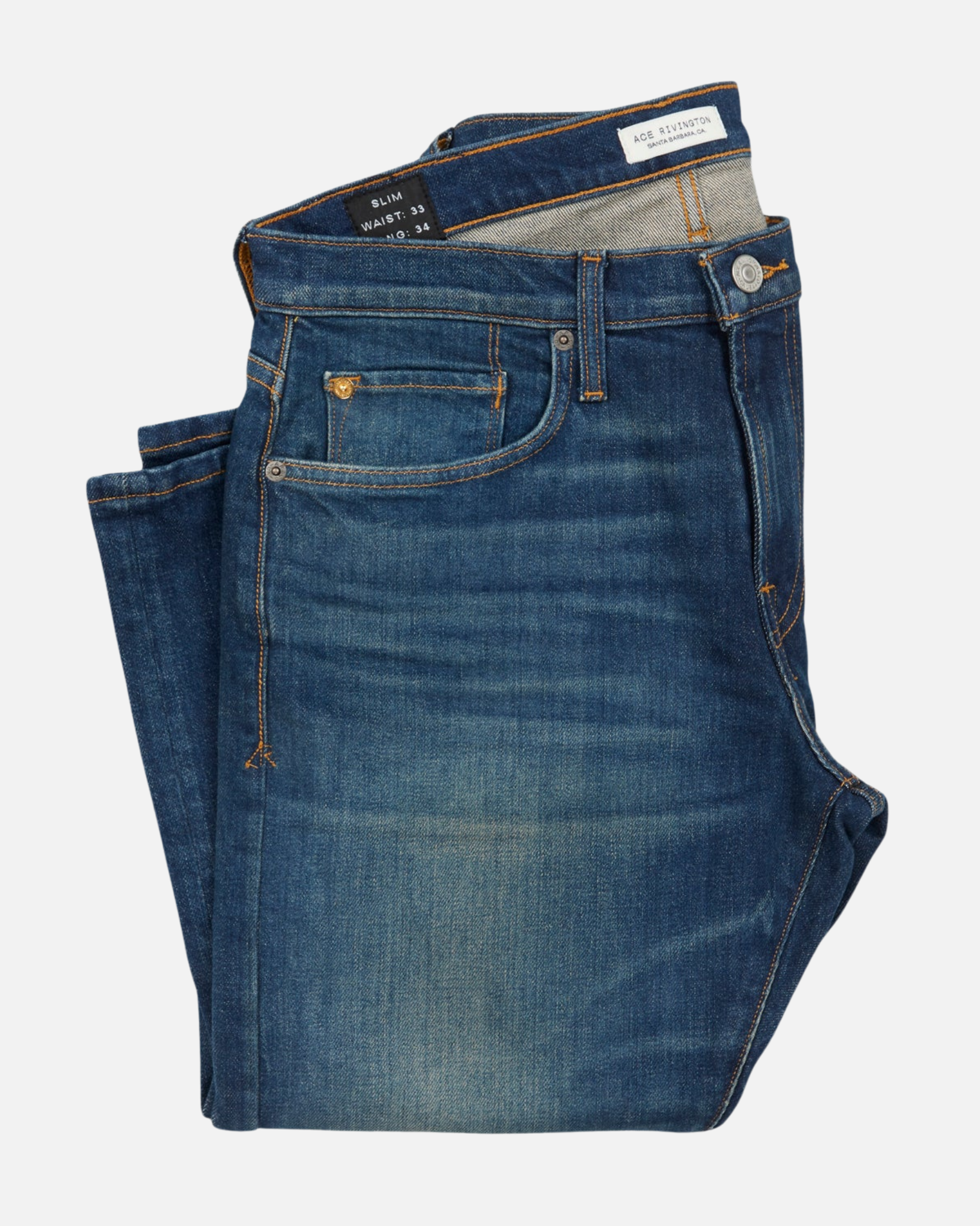 front of folded pair of high quality slim cut  men's green hue blue jeans with slight wear