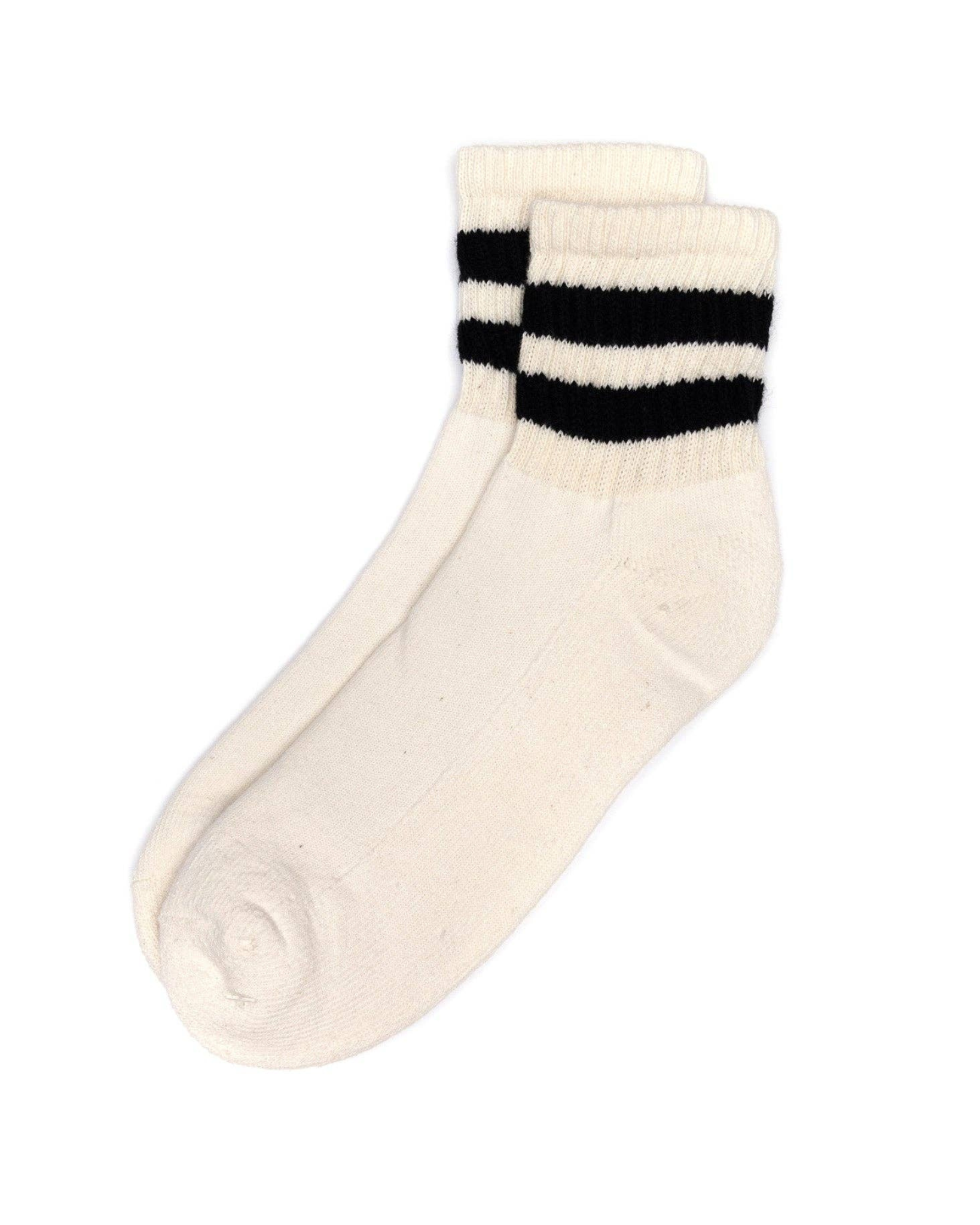 The Mono Stripe Quarter Crew - Black top-down view cream quarter crew sock with double black stripes across the cuff on a white background.