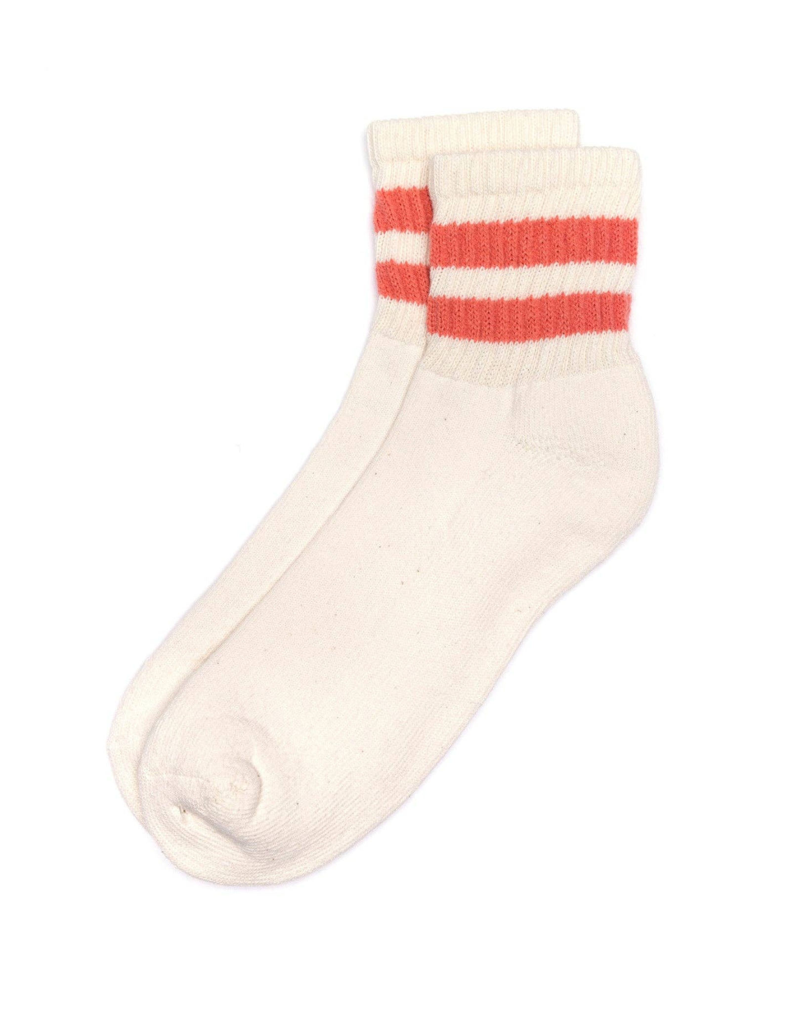 The Mono Stripe Quarter Crew - Coral top-down view cream quarter crew sock with double coral stripes across the cuff on a white background.