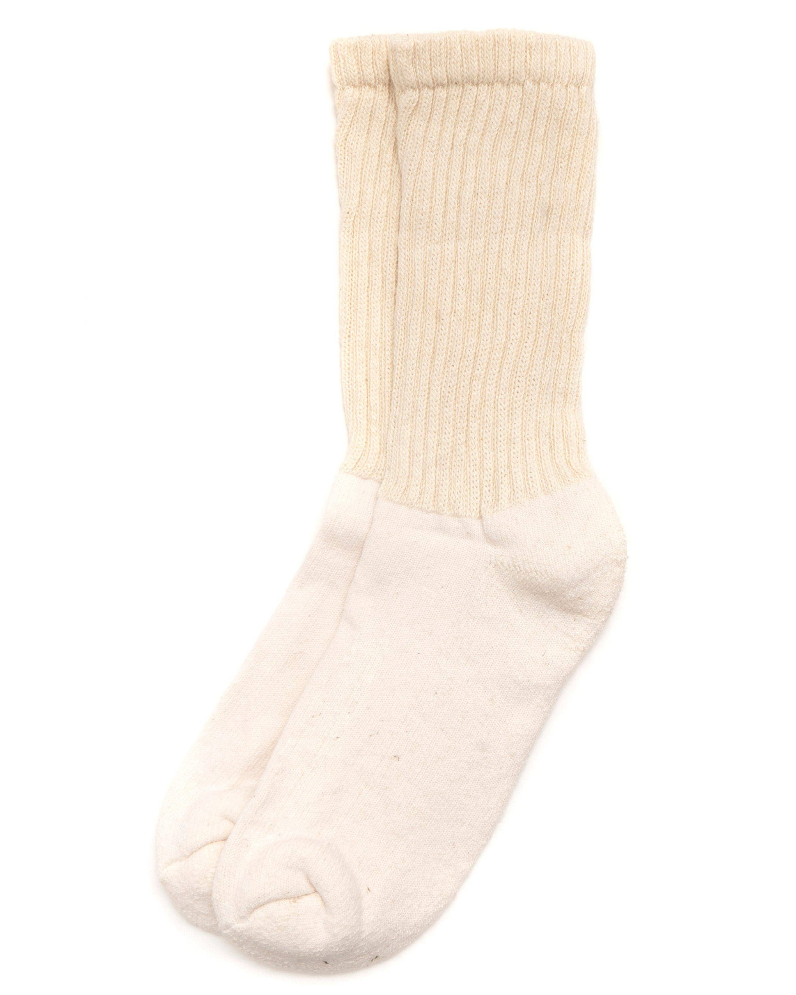 The Solids - Natural in a top-down view with ribbed cuff and soft natural tone on a white background.