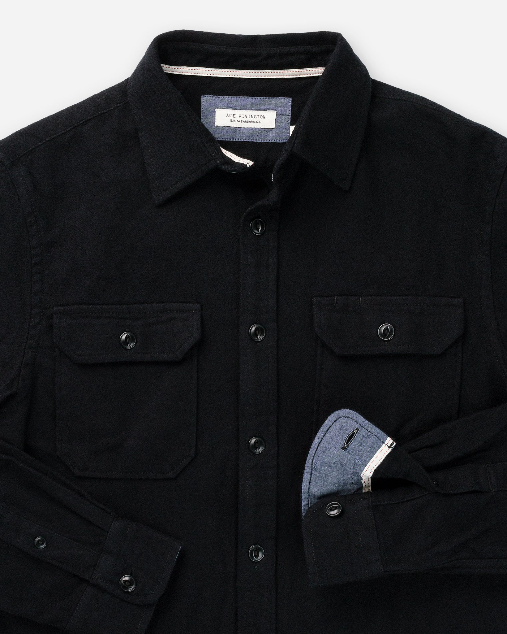close up of collar, interior sleeve, breast pockets, and buttons of ce Rivington men's black soft brushed flannel shirt 