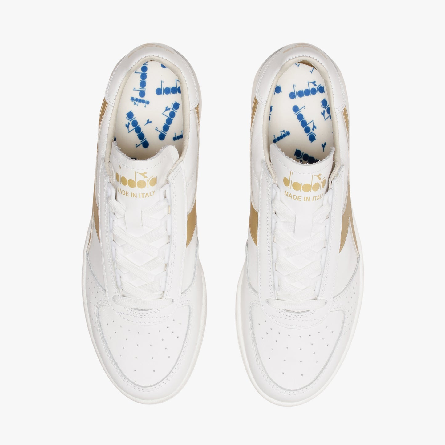 aerial view from above of white and gold B. elite h italia sport diadora shoes made in italy