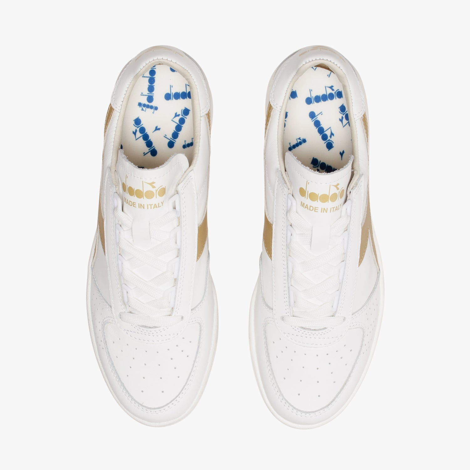 aerial view from above of white and gold B. elite h italia sport diadora shoes made in italy