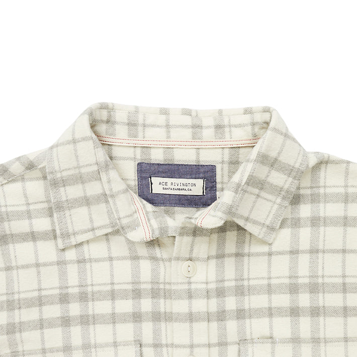 close up of collar and Ace Rivington logo tag on men's off white and grey winter flannel shirt