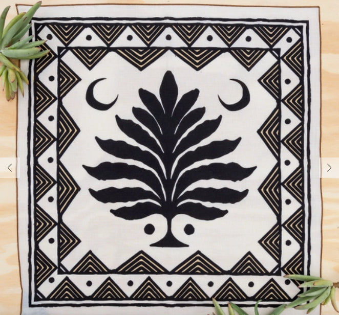 black and white bandana with tree outline and two crescent moons