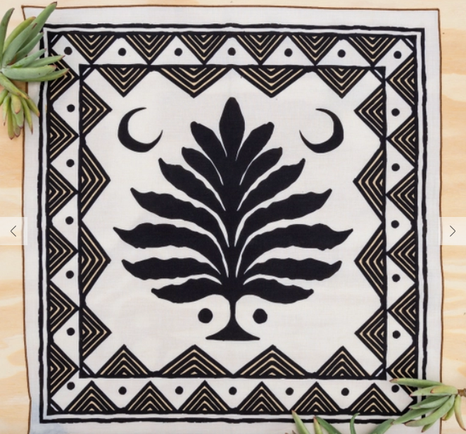 black and white bandana with tree outline and two crescent moons