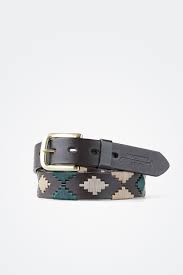 alternate front coiled view of dark brown belt with dark green and beige diamond patterns and a gold buckle