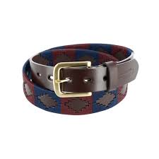 view from above of black belt with dark blue and red diamond patterns stripes and a gold buckle