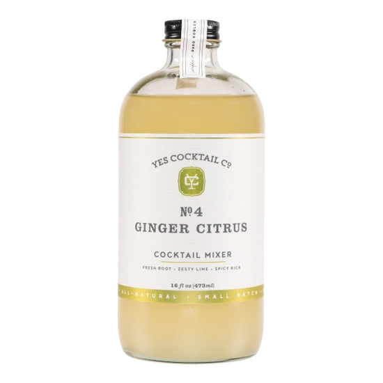 A clear bottle of Ace Rivington Yes Cocktail Co - Ginger Citrus Mixer with a black cap. The white label reads 'YES COCKTAIL CO. NO 4 GINGER CITRUS COCKTAIL MIXER,' highlighting the flavor profile 'Fresh Root - Zesty Lime - Spicy Kick.' The bottle contains 16 fl oz (473 ml) of all-natural, small-batch mixer.
