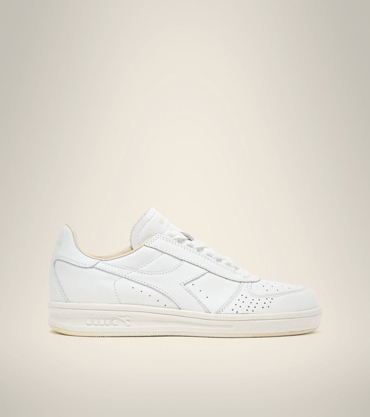 side view of white on white B. elite h italia sport diadora shoe made in italy